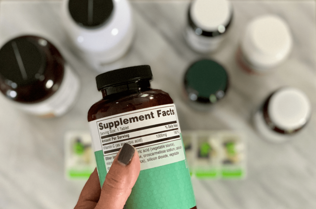 hand-holding-nutraceutical-pill-bottle gun payment processing