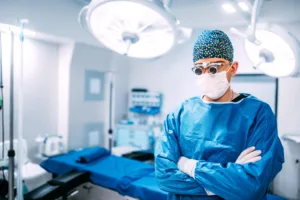 Doctor at work in a surgical setting, representing payment plan financing options for cosmetic surgery patients