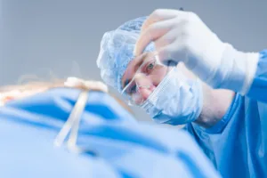 Surgeons marking facial contours on a patient in a cosmetic clinic, representing HIPAA-compliant payment processing for aesthetic practices